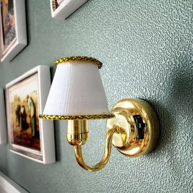 mini-wall-light A vintage mini wall lamp hangs on the wall of the dollhouse