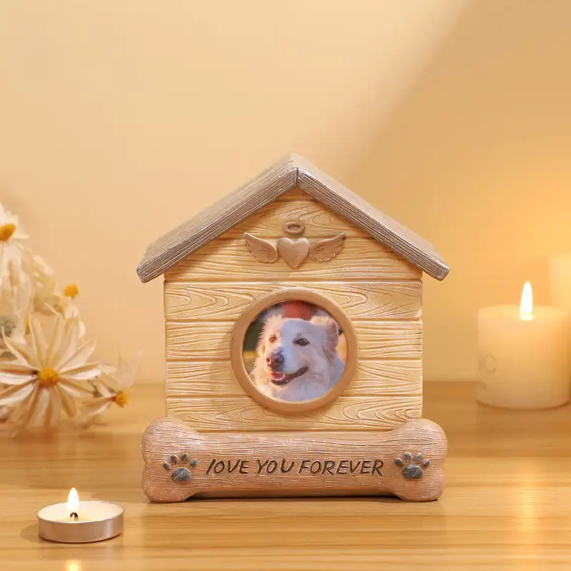 house-shaped-resin-pet-memory-box-with-photo-frame (4) There is a pet keepsake box for dog on the table