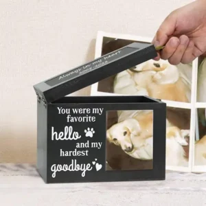 pet-memorial-keepsake-box-with-writable-black-message-plate (4) A hand is opening a black pet memorial keepaske box