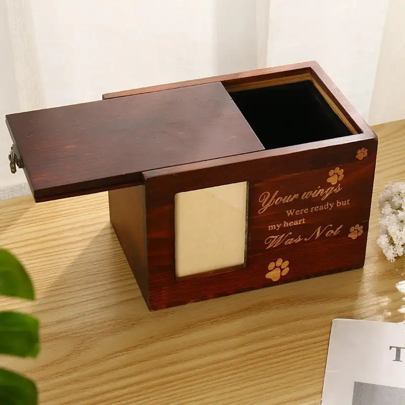 wooden-pet-keepsake-box-with-photo-frame-for-dogs-or-cats (4) There is a opened wodden pet memory box
