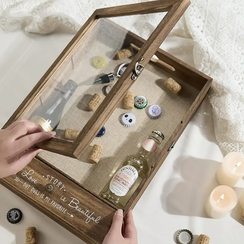 A man open a wedding shadow box