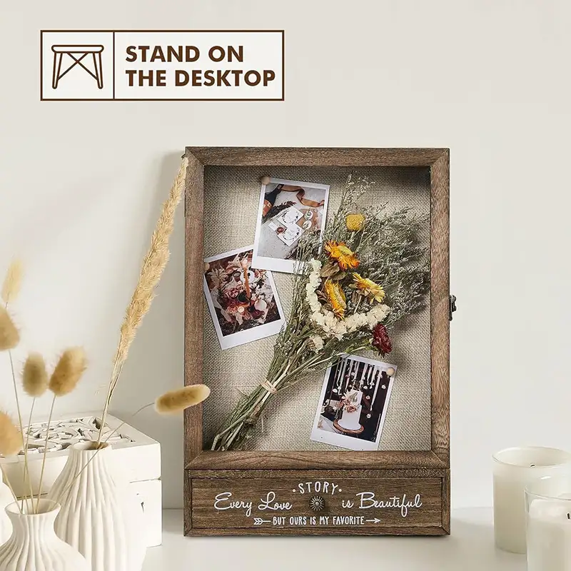 large-wedding-keepsake-shadow-box-with-removable-shelves-and-drawers (5) A weding shadow box is on the table