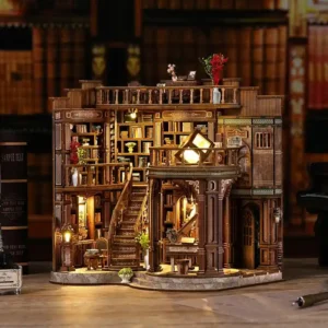 a-book-nook-miniature-house-kit-is-on-the-desk A book hall miniature house is on the desk