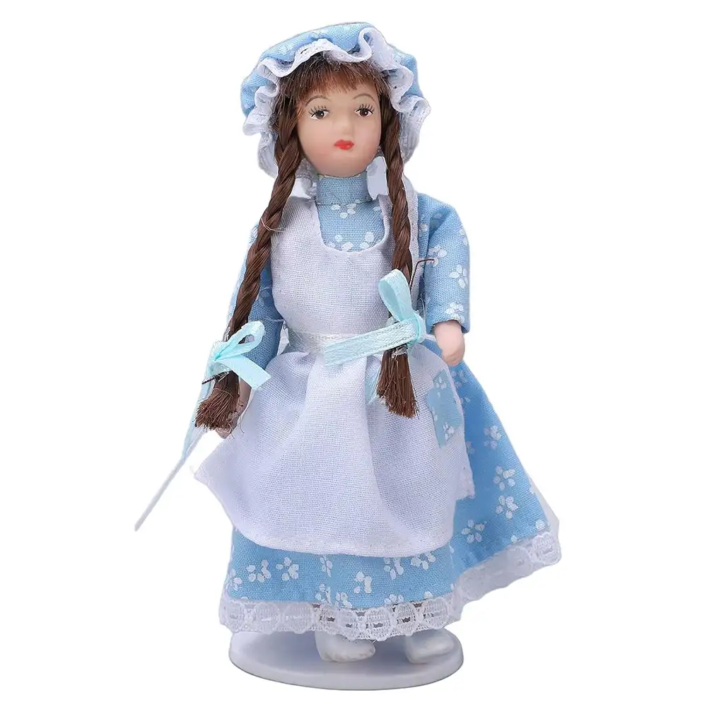a-dollhouse-maid-girl-in-blue-dress A dollhouse maid girl