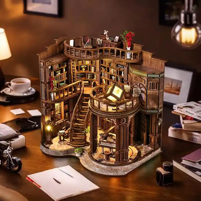a-miniature-house-is-on-the-desk A dreamy book hall mini house with light is on the desk