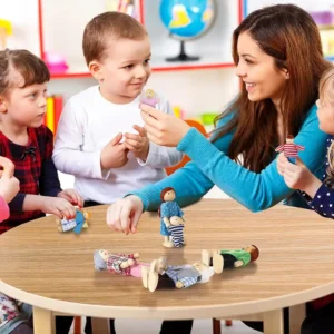 a-woman-and-3-child-are-playing-the-dollhouse-dolls A woman and 3 child are playing with the dollhouse dolls