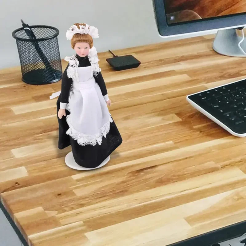 the-porcelain-maid-is-on-the-office-table The porcelain maid is on the table